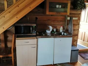 Фото номера Дом с 1 спальней Дома для отпуска Cabin with Sauna and pond, optional Hot Tube г. Ķeņini 12