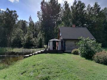 Фото номера Дом с 1 спальней Дома для отпуска Cabin with Sauna and pond, optional Hot Tube г. Ķeņini 21