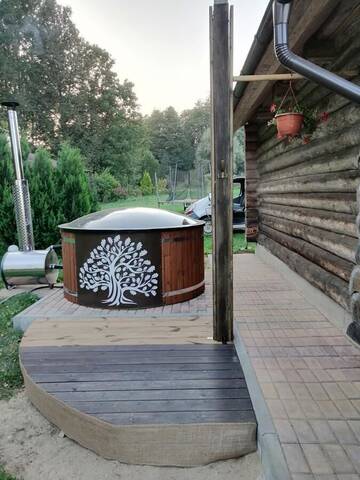 Фото Дома для отпуска Cabin with Sauna and pond, optional Hot Tube г. Ķeņini 3