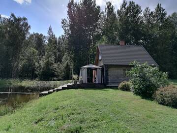 Фото номера Дом с 1 спальней Дома для отпуска Cabin with Sauna and pond, optional Hot Tube г. Ķeņini 10